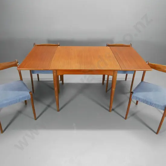 mid-century Scandinavian style teak end-leaf dining table & 4 velvet upholstered chairs. Wear to finish H740 900x900