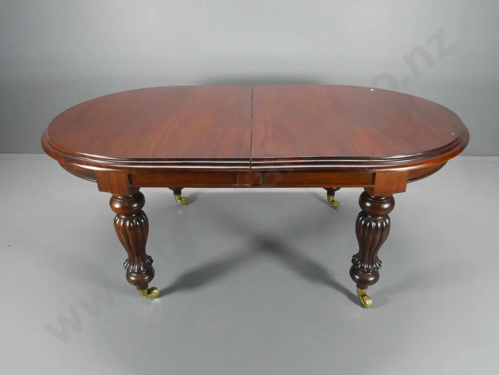vintage mahogany oval dining table, 2 leaves, crank,  brass casters, 8 splat back chairs H770 W1100 L2580 Image 1++