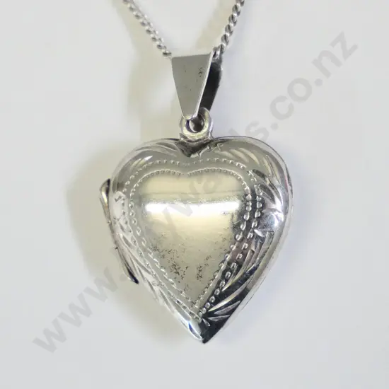 silver heart shaped locket stamped 925
