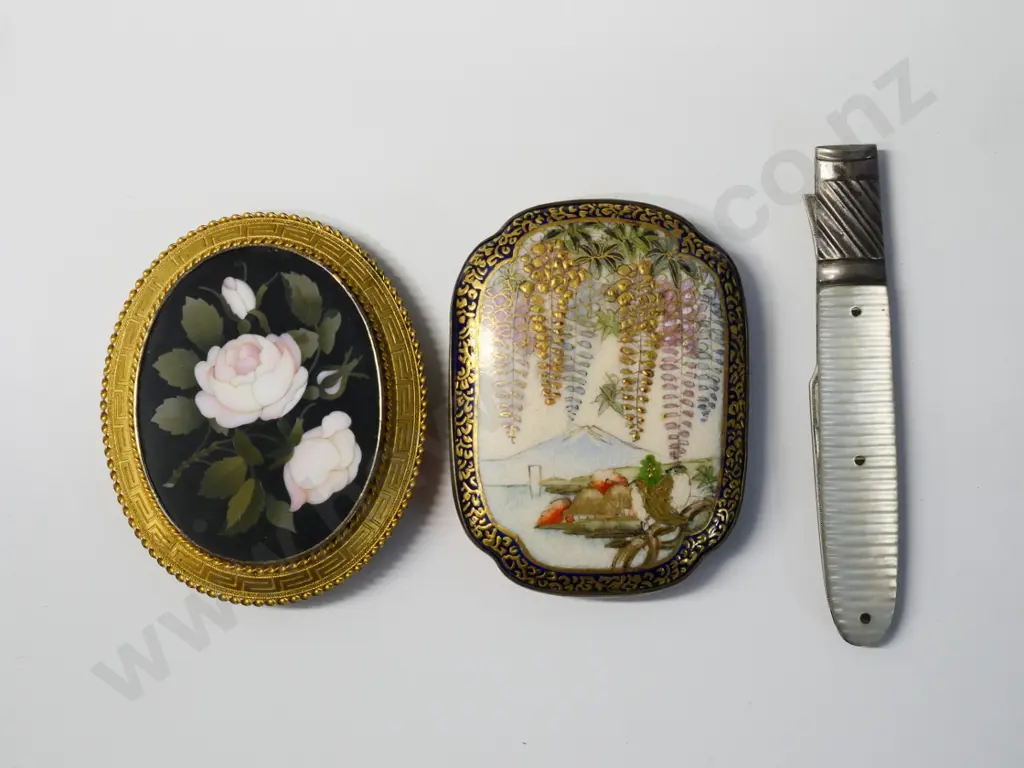 2 vintage belt buckles - one Japanese Satsuma, one Italian stone inlay, and a mother of pearl handled folding fruit fork Image 1++
