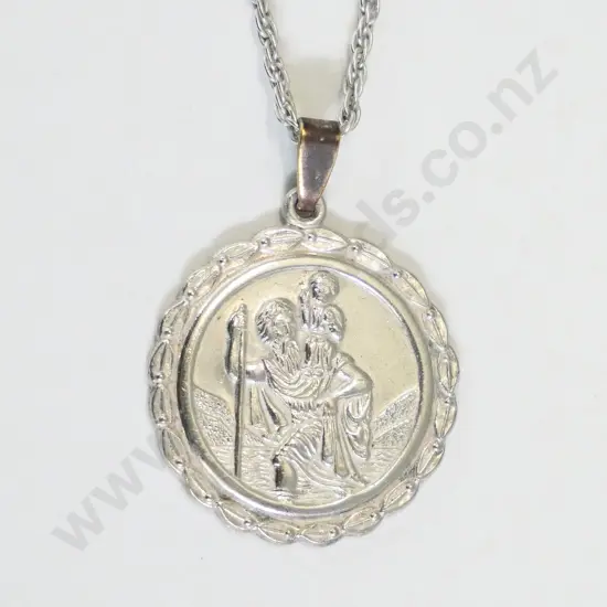 silver religious medalion stamped sterling silver - engraved on back