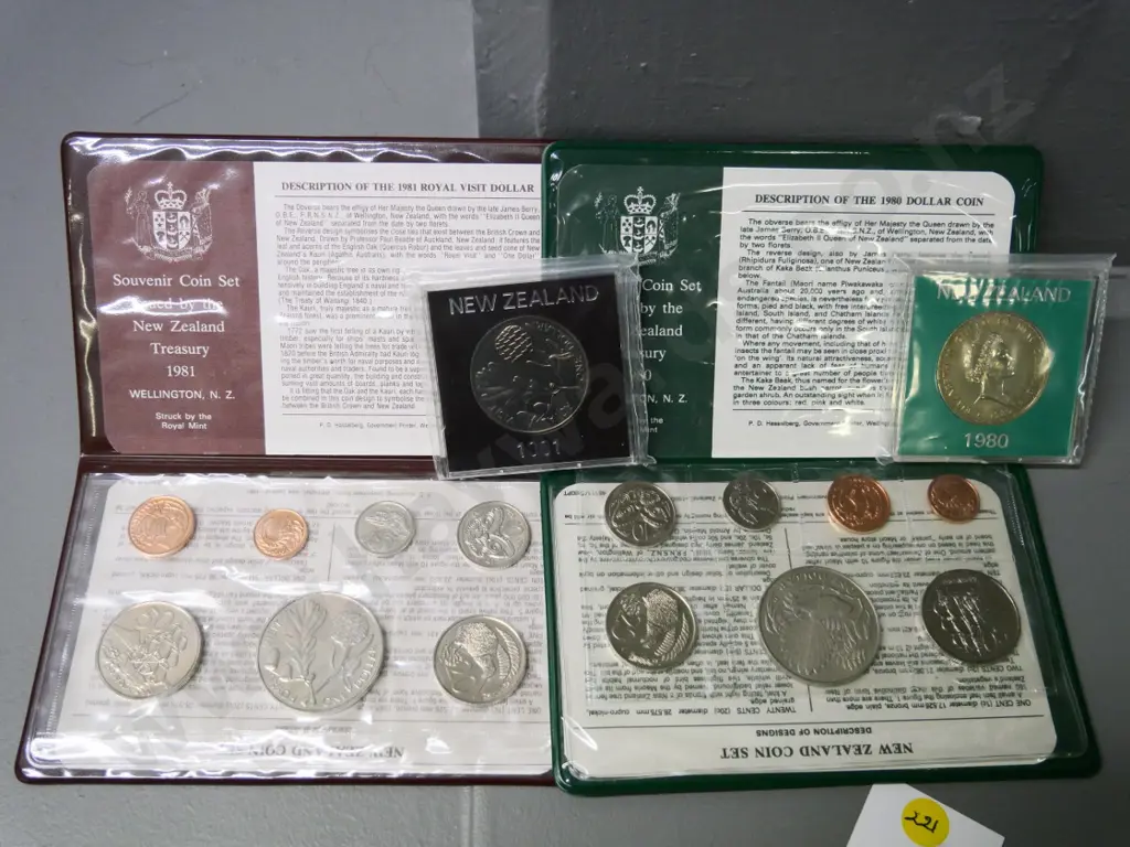 Cased New Zealand coin sets - 1980 and 1981 - souvenir sets with dollar and individual dollars Image 1++