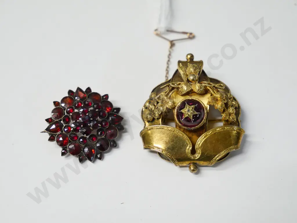2 brooches - one marked 9 CT with cluster of red stones, the other unmarked Image 1++