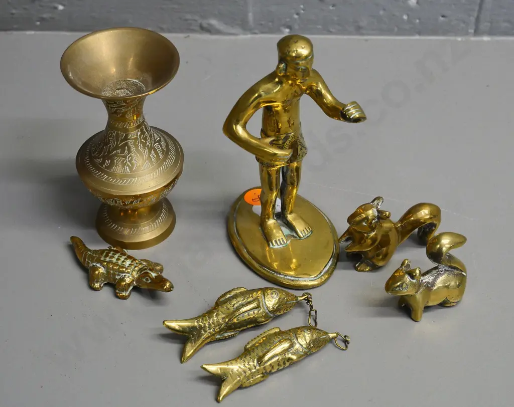 assorted small brassware including a standing figure H140 (missing piece?) miniature animals, 2 fish pendants, etc. Image 1++