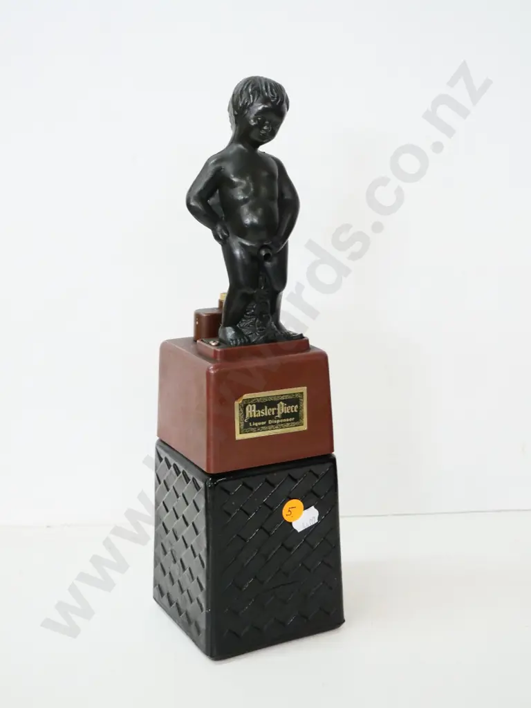 retro plastic and coloured glass Masterpiece liquor dispenser with peeing boy figure H-335 Image 1++