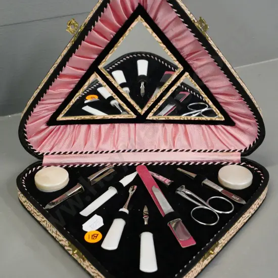 manicure set in fitted case with triangular mirrors in lid, faux mother of pearl handles