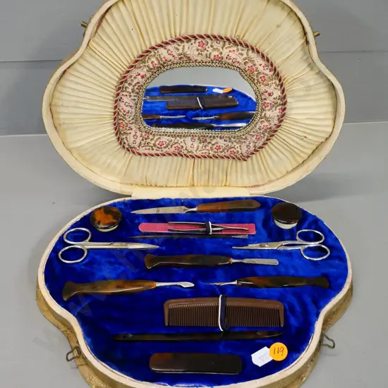 shell shaped manicure set in fitted case with faux tortoise shell handles