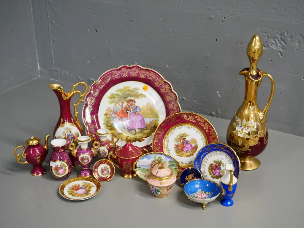 large collection of Limoges items - large plate is D-260 - and a red Venetian glass stoppered decanter H-330 Image 1++