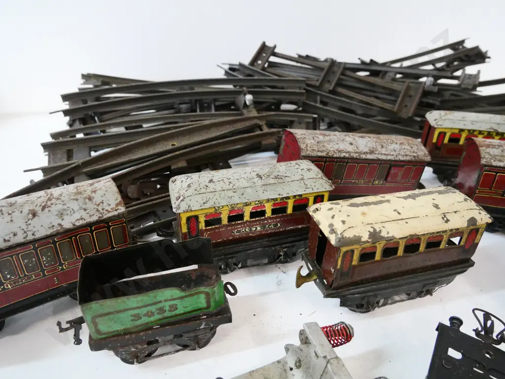 Hornby model train pieces - 2 key-wind locomotives, rolling stock and assorted track - general corrosion and wear Image 1++