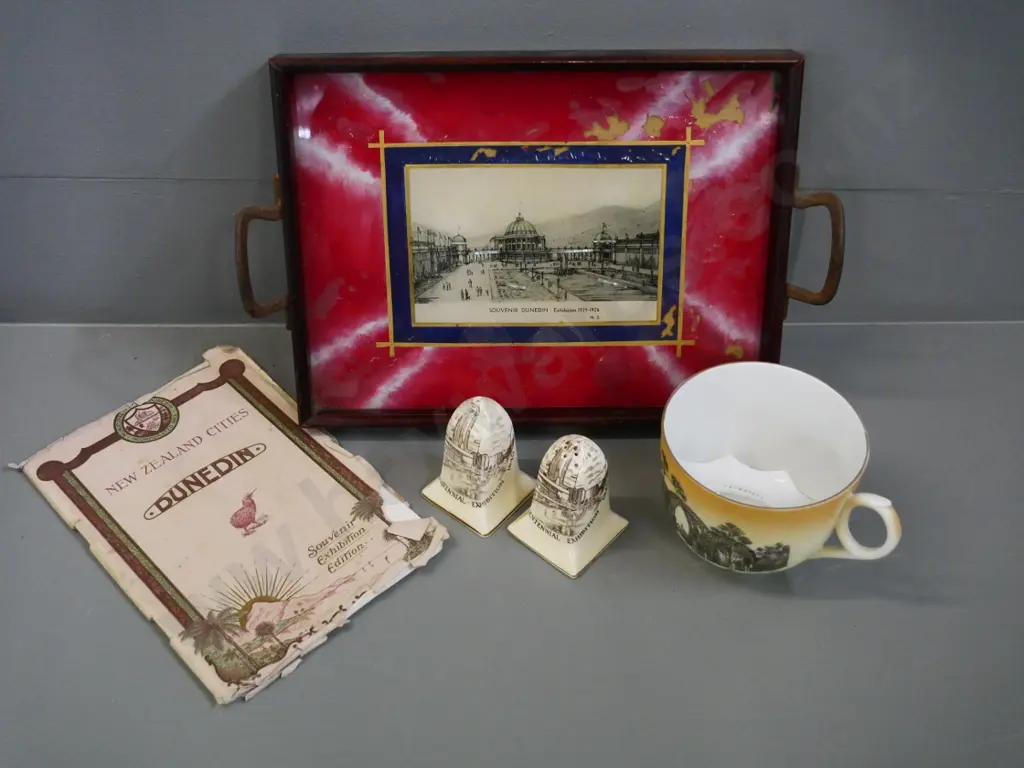 souvenir ware - 1940 centenary salt & pepper, Dunedin 1925 exhibition book & tray (poor condition) Rotorua mustache cup Image 1++