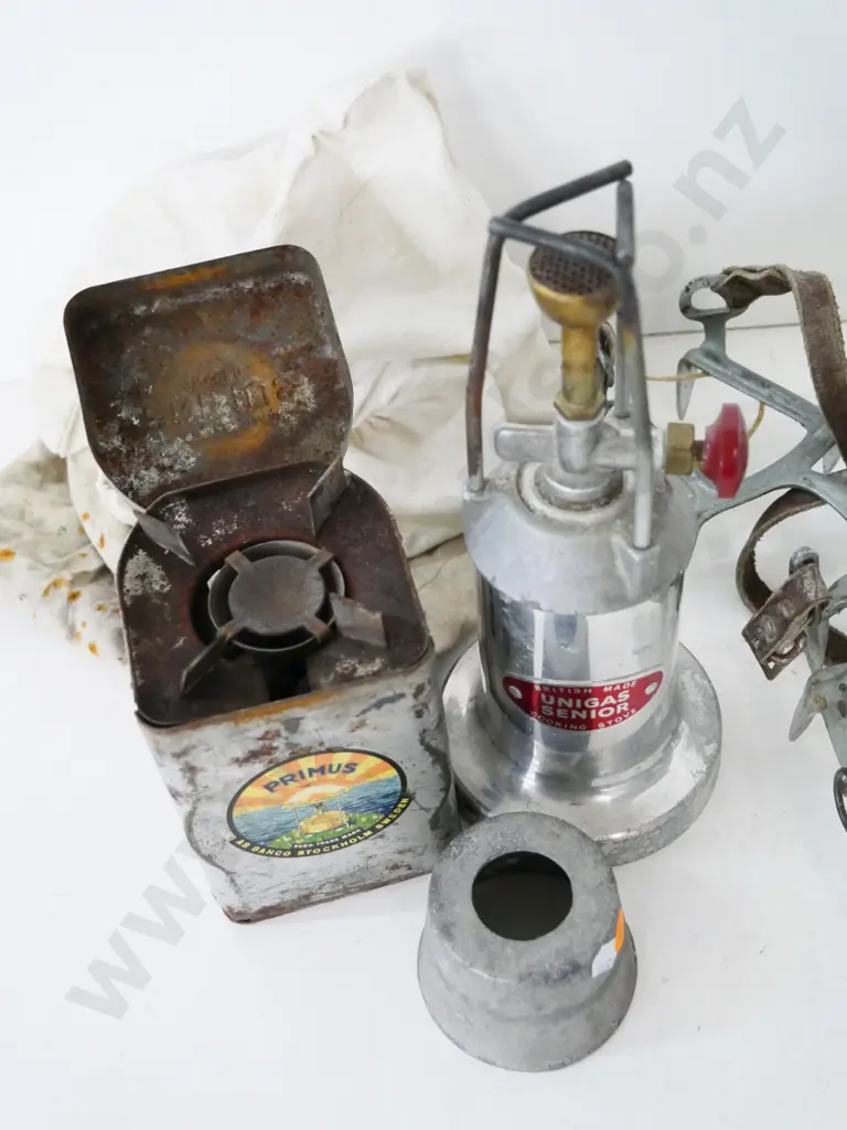 vintage Primus tin stove, Unigas Senior stove H-250 and a pair of 'Everest' mountaineering crampons with leather straps Image 1++