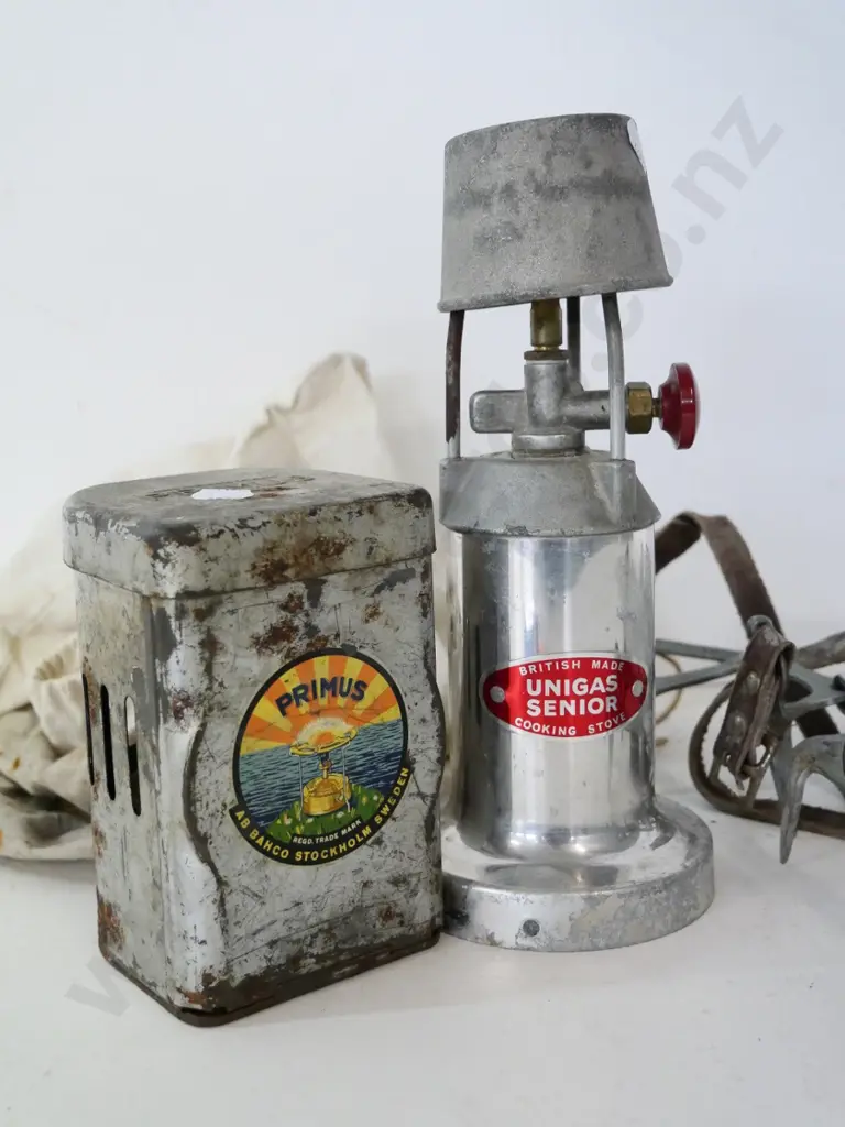 vintage Primus tin stove, Unigas Senior stove H-250 and a pair of 'Everest' mountaineering crampons with leather straps Image 1++
