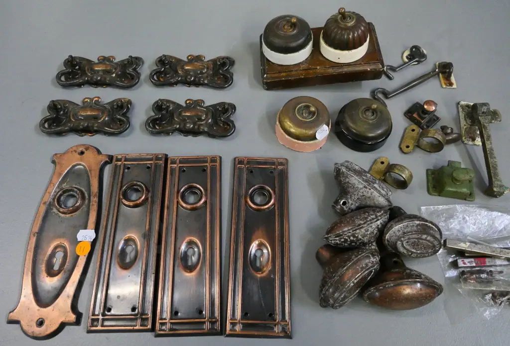 assorted vintage copper door plates, knobs, 4 drawer pulls, plus 4 vintage light switches, hooks, latches etc. Image 1++