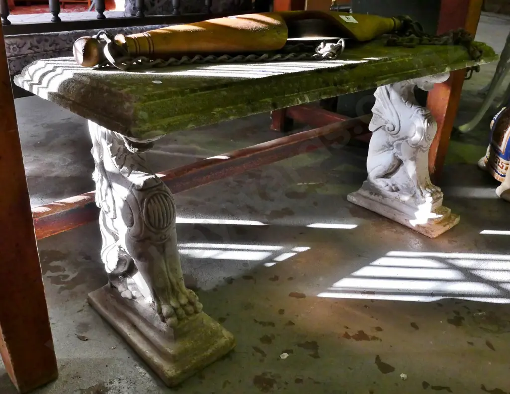 concrete garden bench seat with animal theme stands H-450 W-1060 D-380 -chip to one of the stands- Image 1++