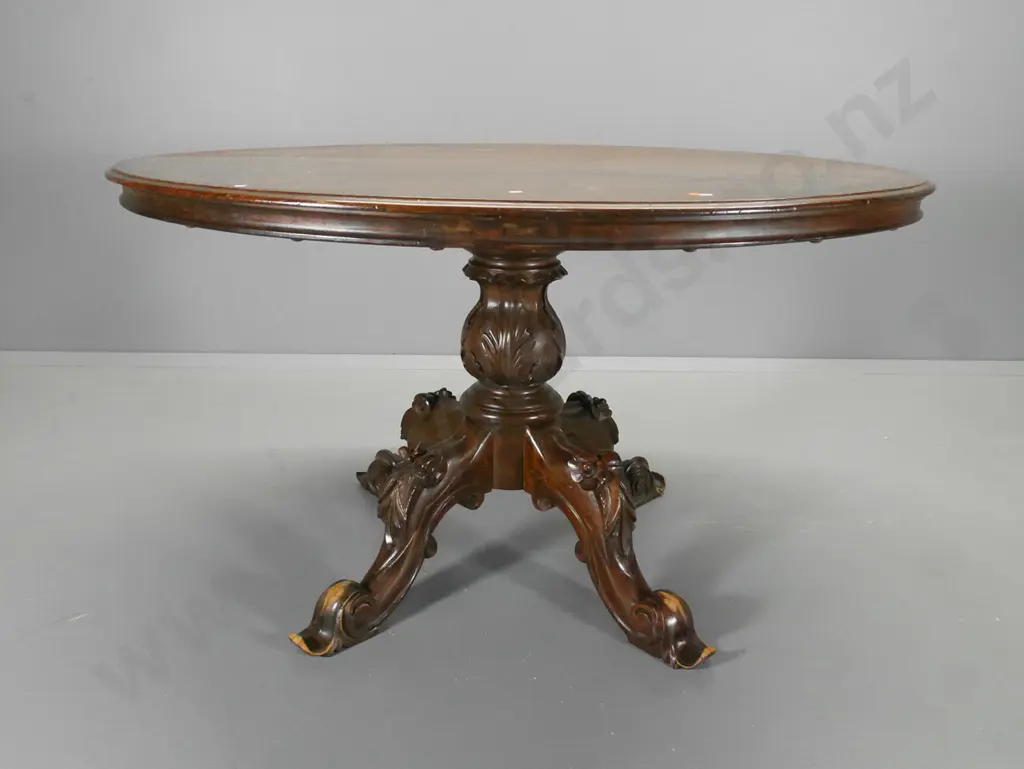oval mahogany dining table with ornately carved pedestal base, damage esp. to feet H760 L1350 W1030 Image 1++