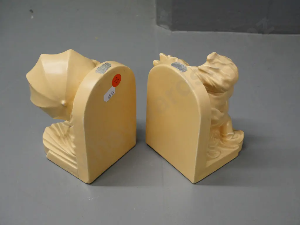 pair of Bretby books ends - 'March' boy and 'April' girl - each H-130 W-90 D-90 Image 1++