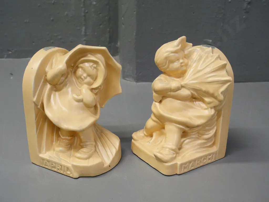 pair of Bretby books ends - 'March' boy and 'April' girl - each H-130 W-90 D-90 Image 1++
