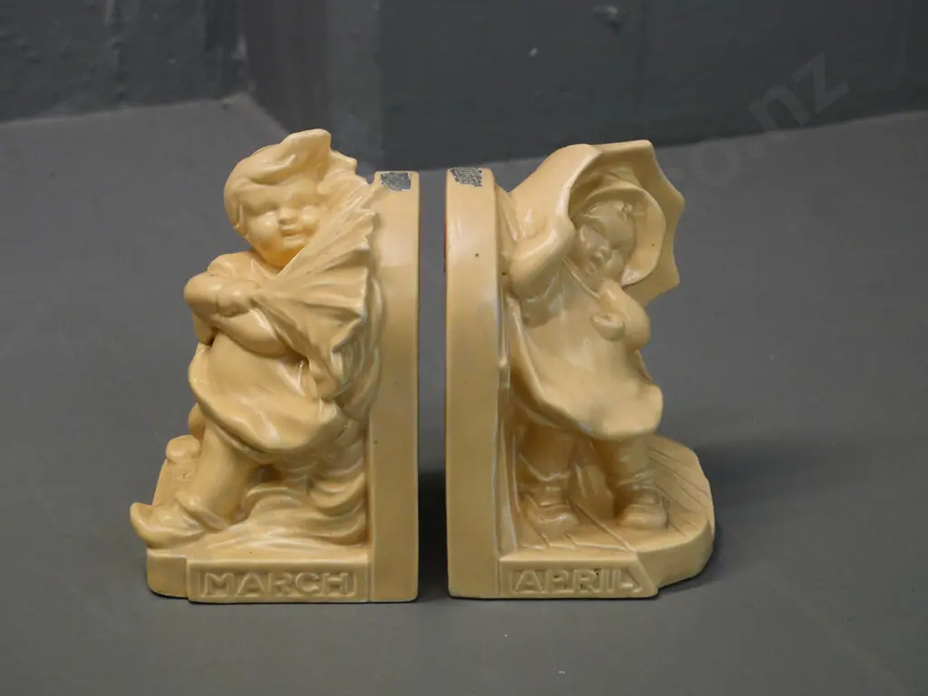 pair of Bretby books ends - 'March' boy and 'April' girl - each H-130 W-90 D-90 Image 1++