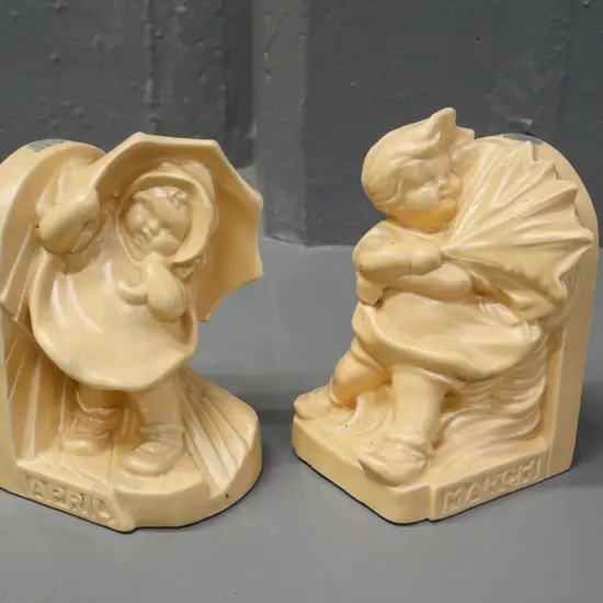 pair of Bretby books ends - 'March' boy and 'April' girl - each H-130 W-90 D-90