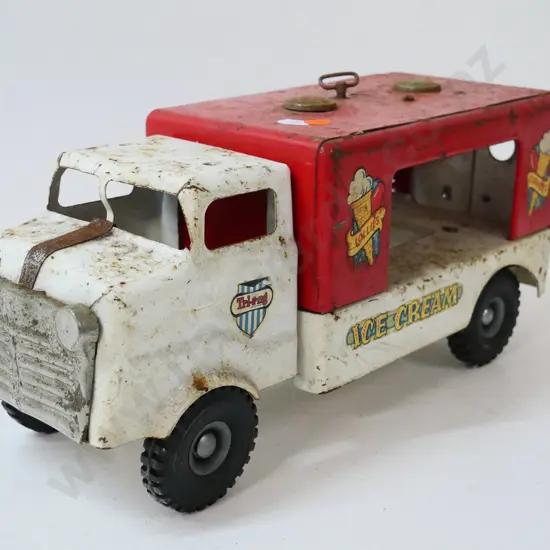 vintage Triang ice cream truck with working music box - has corrosion and pitting, may be missing parts L-400