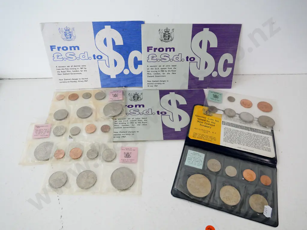 8 New Zealand coin sets - 1967 sets, some multiples, 1965 and one vinyl cased 1970 Royal Tour Image 1++