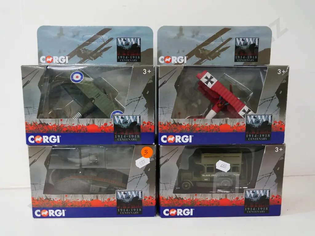 4 small boxed Corgi WW1 centenary die-cast model vehicles - 2 biplanes, ambulance bus and tank Image 1++