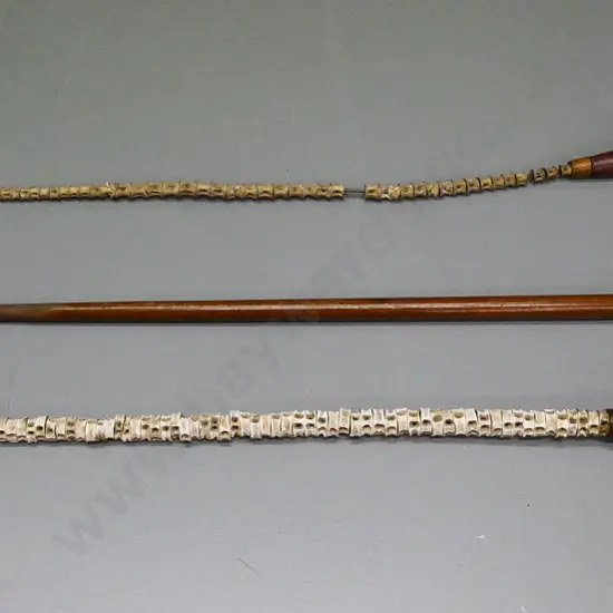 3 walking sticks - one horn-handled, two metal and timber with (shark?) vertebrae, one in restorer's condition