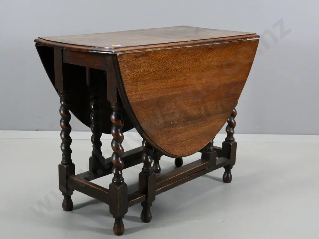 solid oak oval drop-side barley twist gate-leg table H720 W900 L-1320 open, L-450 closed Image 1++
