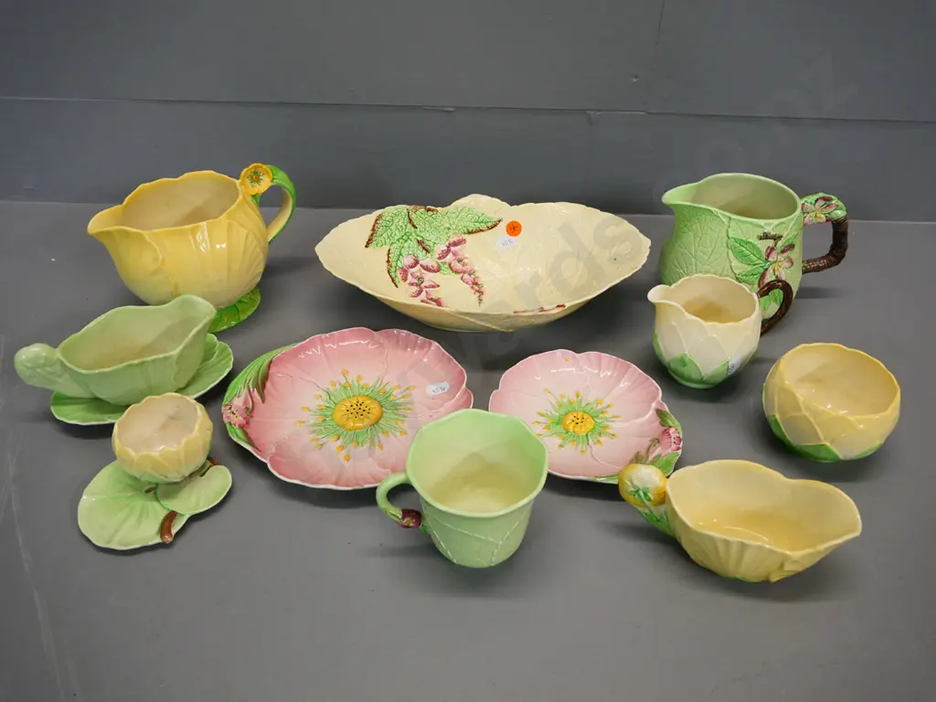 11 assorted Carlton Ware items including buttercup jug, dogwood jug, water lily cream & sugar, etc. Image 1++