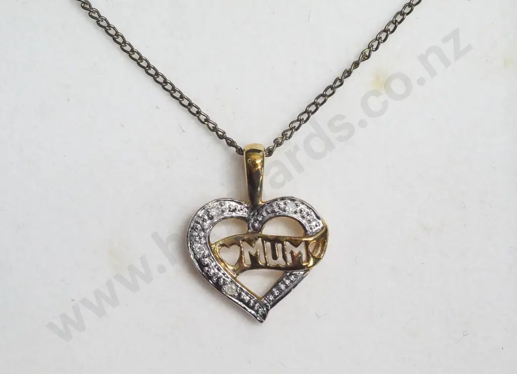 heart shaped necklace with diamantes and the word mum Image 1++