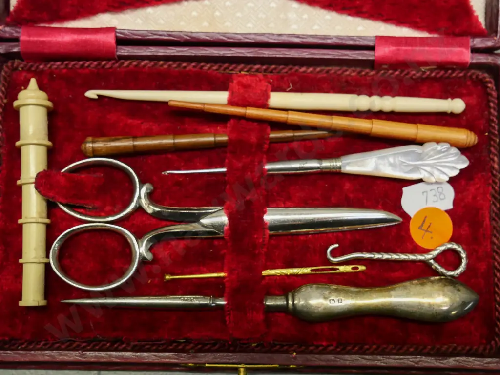 sewing/manicure case with sterling silver handled button hook, thread, pin cushions, bone and wood items, etc. Image 1++