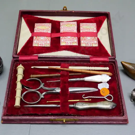 sewing/manicure case with sterling silver handled button hook, thread, pin cushions, bone and wood items, etc.