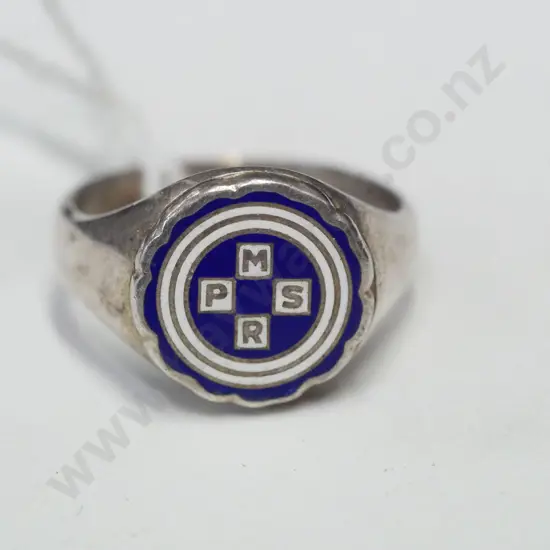 silver ring with letters PMSR stamped sterling