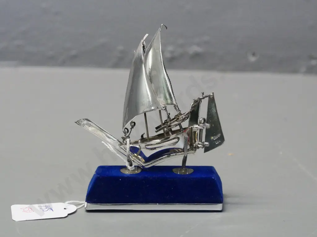 small sterling silver ship on stand stamped silver 925 Image 1++