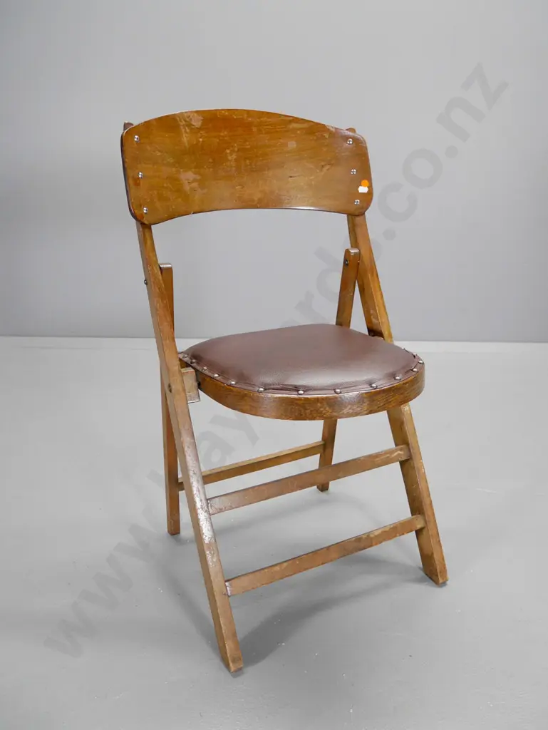 vintage mixed timber folding chair with studded leatherette seat - wear to finish H-860 W-470 D-410 Image 1++