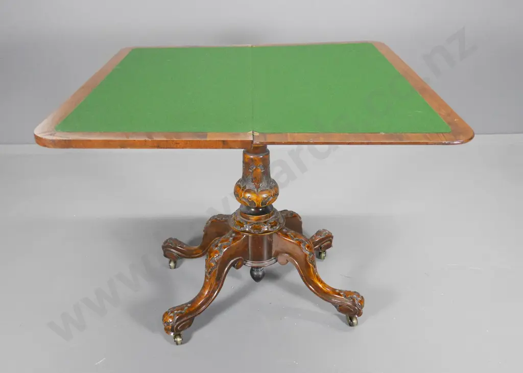 antique games table with burr walnut top with heavily carved pedstal base on casters H-760 900x900 when open Image 1++