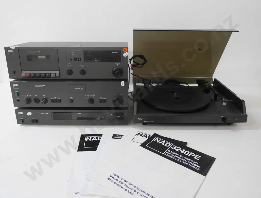 NAD amplifier, turntable, tuner, cassette. Turntable missing mat, plug cut off, others power up OK but not fully tested Image 1++