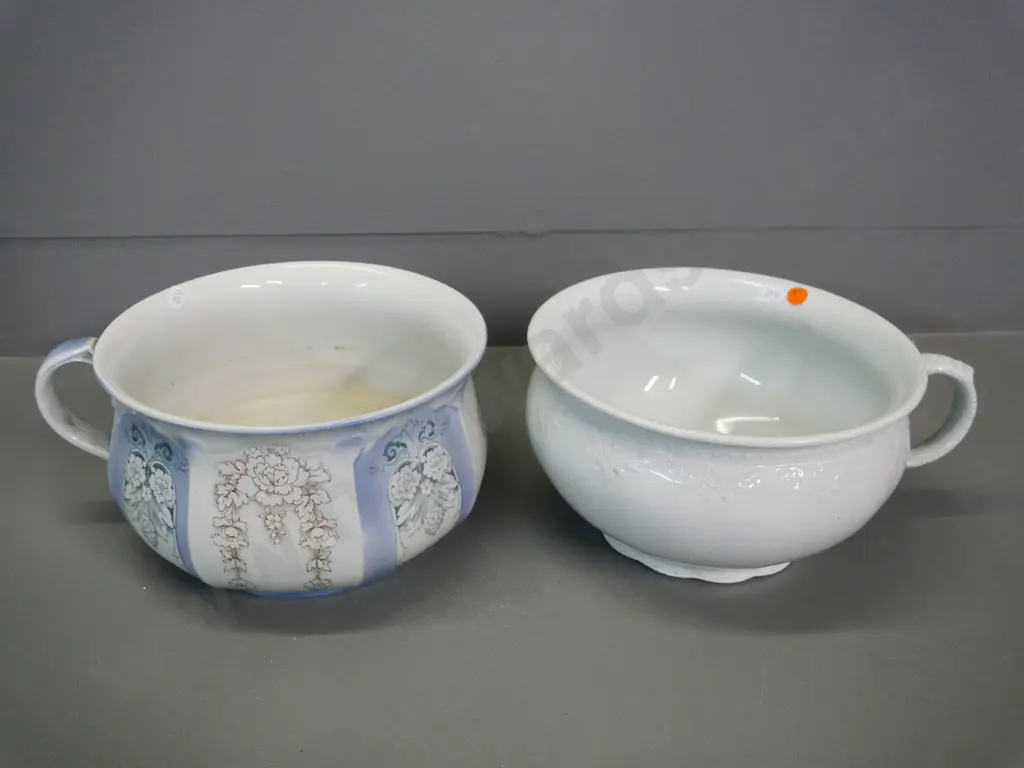 2 chamberpots - one relief pattern Alfred Meakin, one floral F & Sons (some discolouration) Image 1++