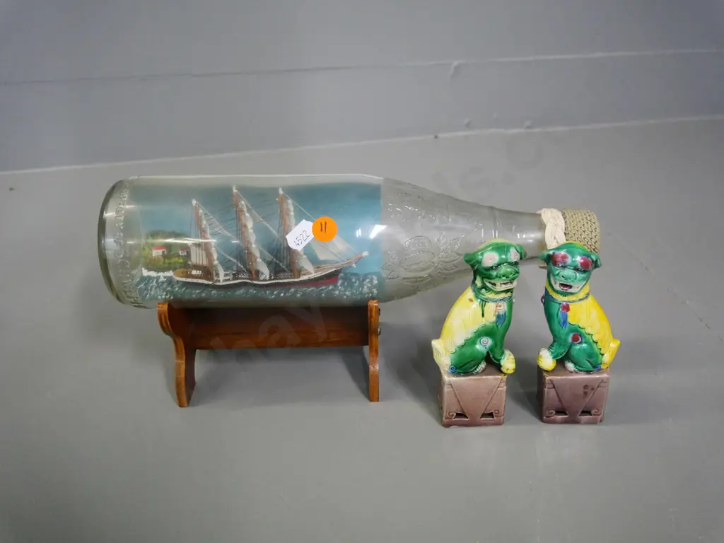 ship in a bottle on wooden stand L-300 and a small pair of porcelain foo dogs Image 1++