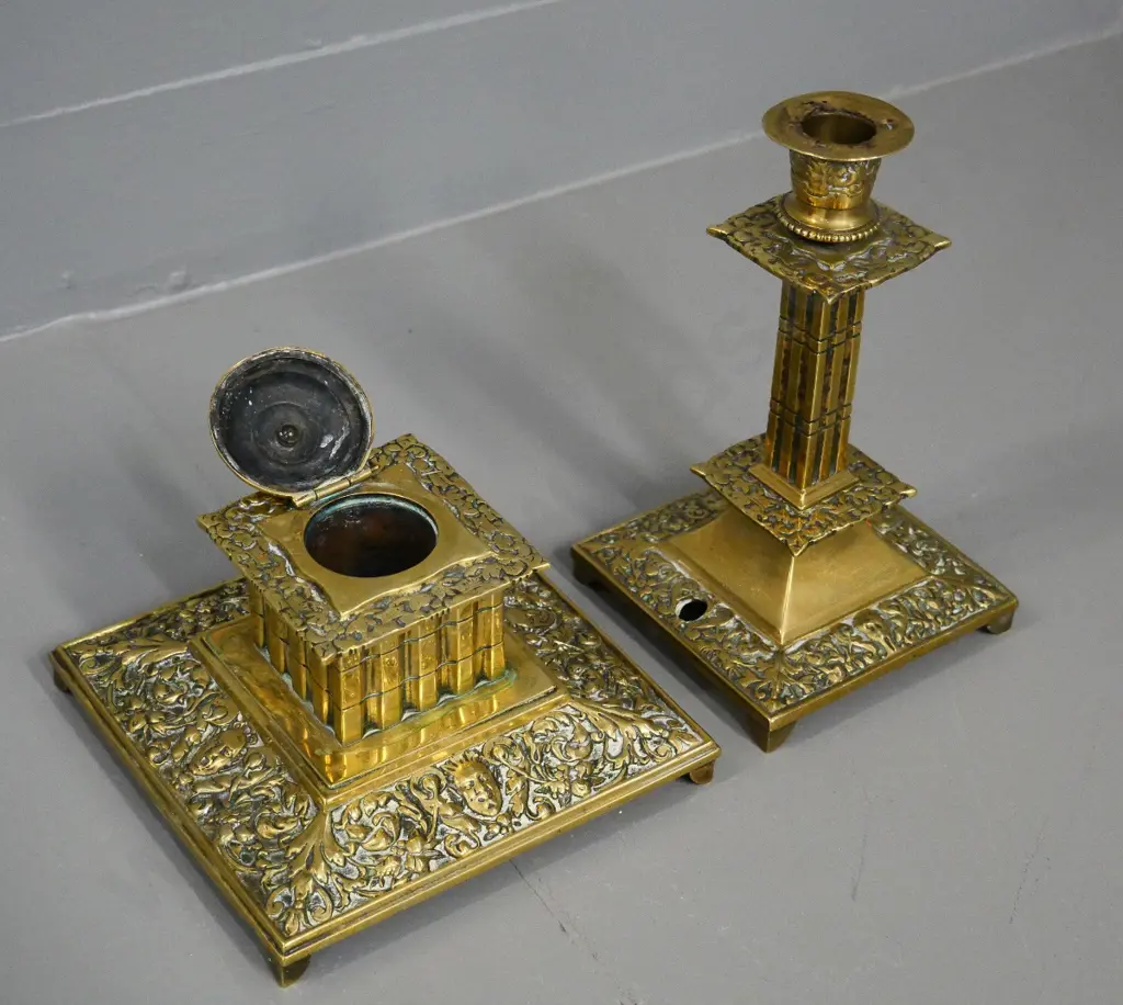 ornate figured brass items - candlestick with hole in base H-200 and an inkwell Image 1++