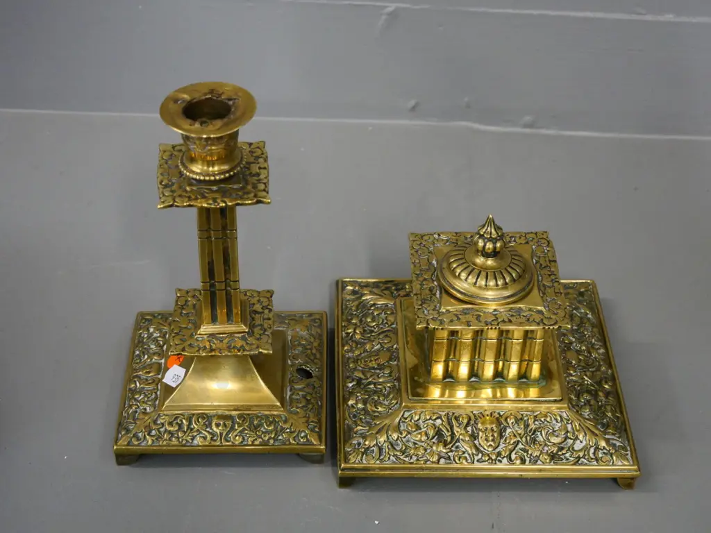 ornate figured brass items - candlestick with hole in base H-200 and an inkwell Image 1++