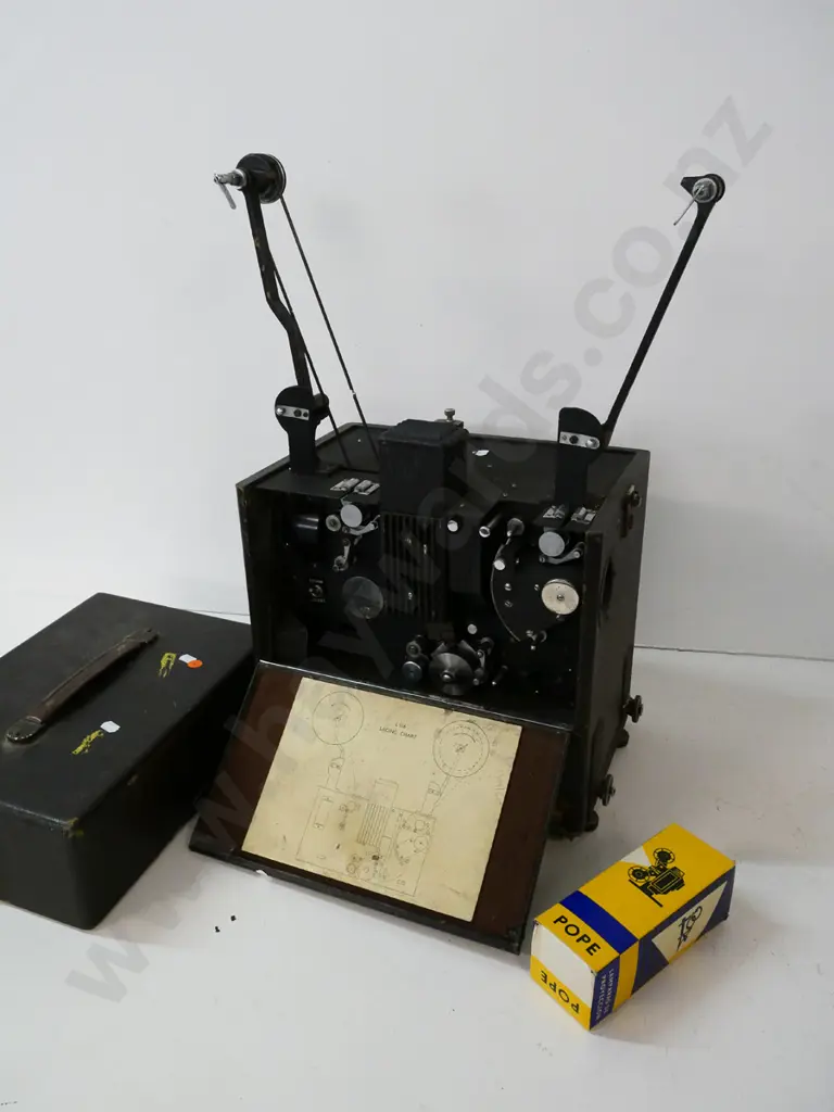 vintage GB Equipments portable 16mm cine projector, spare bulb, no cord (untested) plus 2 reels of film and empty reel Image 1++