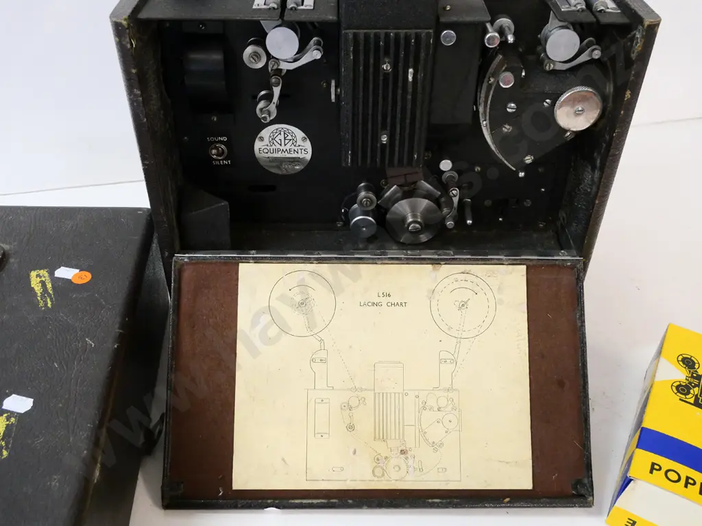 vintage GB Equipments portable 16mm cine projector, spare bulb, no cord (untested) plus 2 reels of film and empty reel Image 1++
