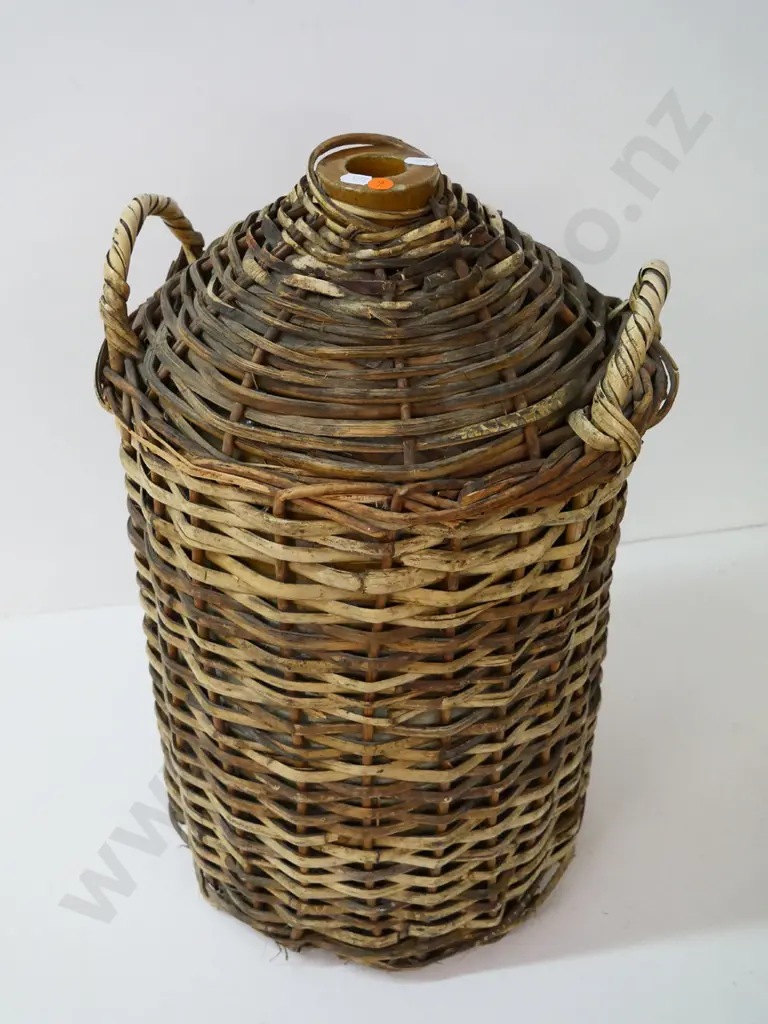stoneware narrow-mouth crock in full cane cover with handles - some chips to rim H-540 Image 1++