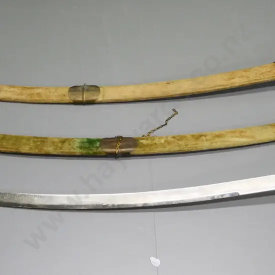 pair of Indian decorative swords with horse-head brass handles - wear, corrosion and missing chains L-940