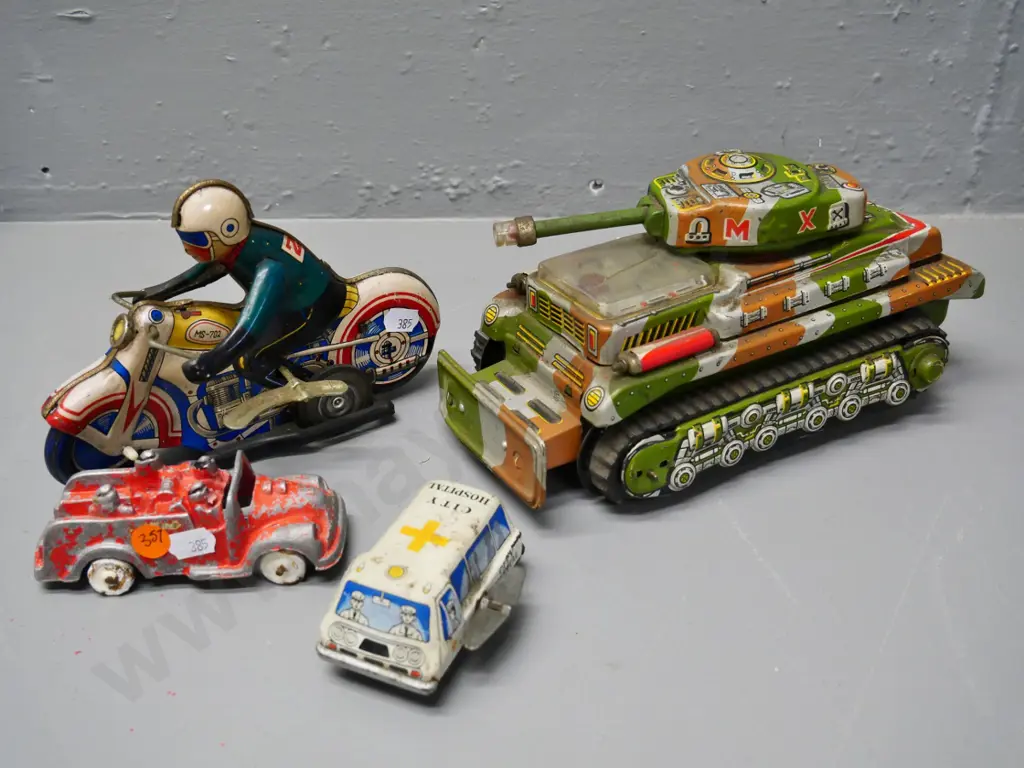 4 toy vehicles - 3 tin plate and a cast metal Fun Ho fire engine - all have wear, motorbike goes Image 1++