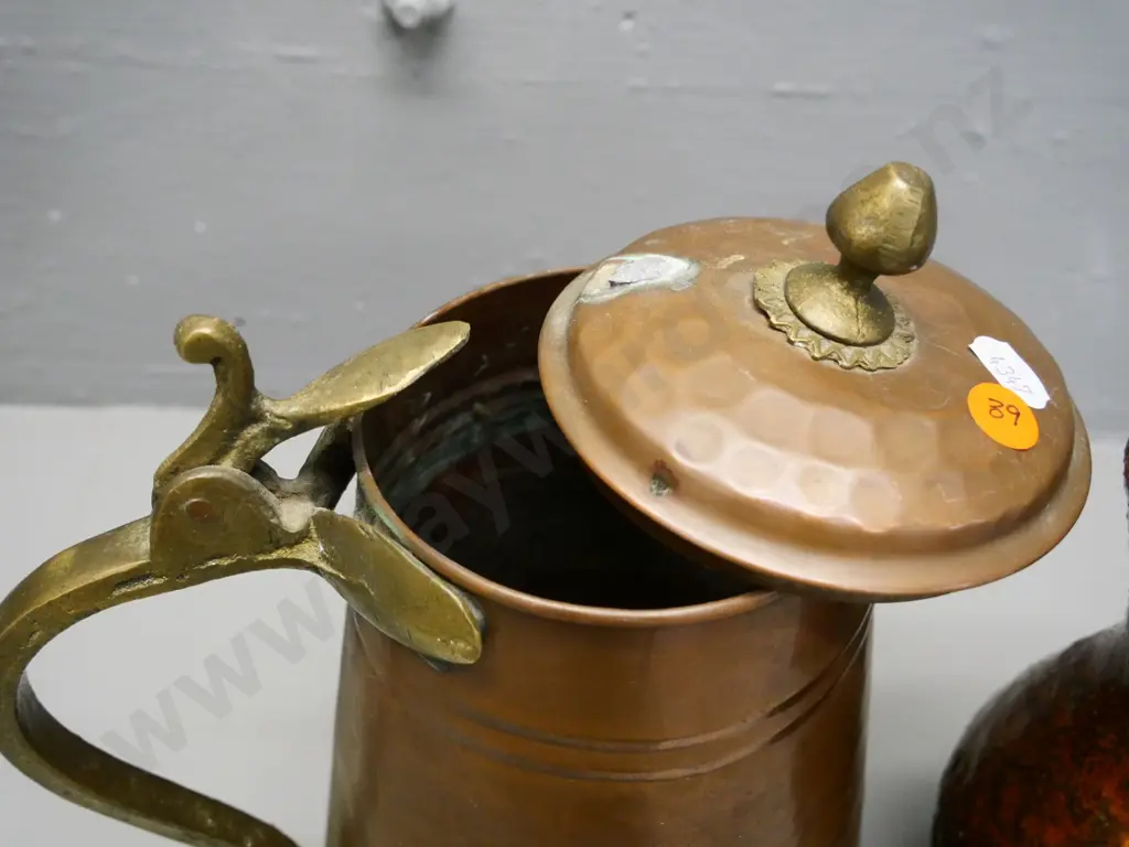 copper and brass jug H270 (lid separated, previous mend, hinge stiff) and a small German pottery vase Image 1++