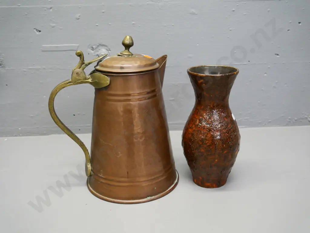copper and brass jug H270 (lid separated, previous mend, hinge stiff) and a small German pottery vase Image 1++