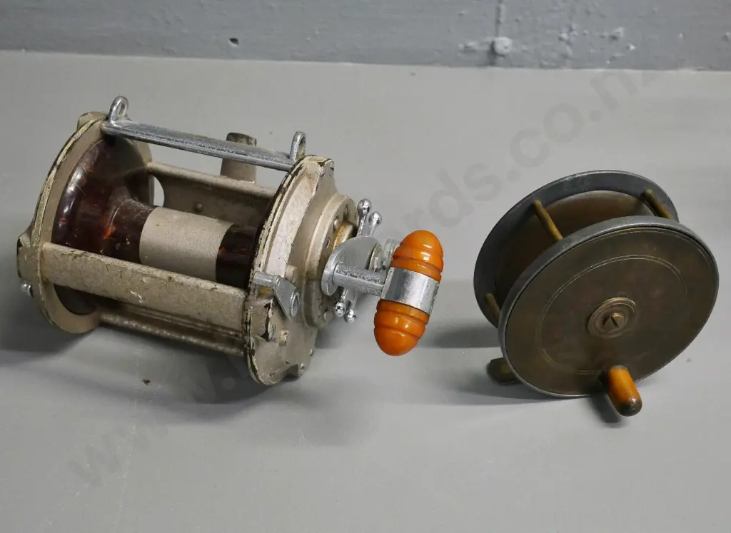 Grice & Young Tatler 5 ocean fishing reel and a metal fly reel, no maker's mark, Diameter 100 Image 1++