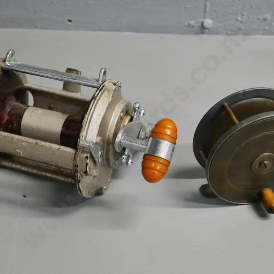 Grice & Young Tatler 5 ocean fishing reel and a metal fly reel, no maker's mark, Diameter 100